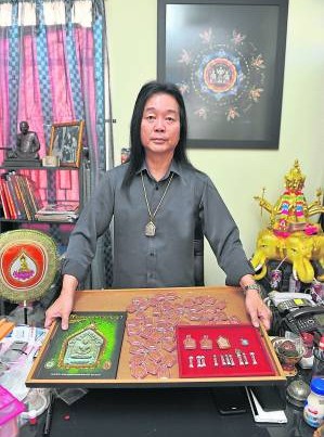 金口师父表示,天天把“张天师”带在身,可以防小人。