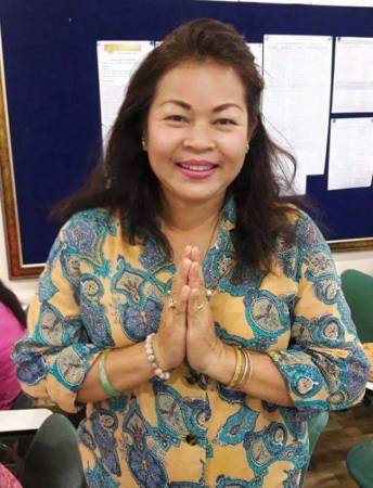 Nancy Wiwanthip说,善信遇到问题时,她都会指点他们佩戴富贵圣猴。
