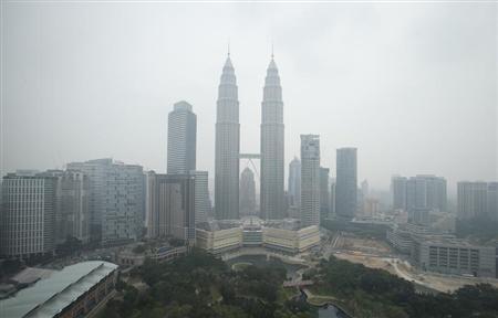 The Petronas Twin Towers is obscured by the haze in Malaysia's capital of Kuala Lumpur