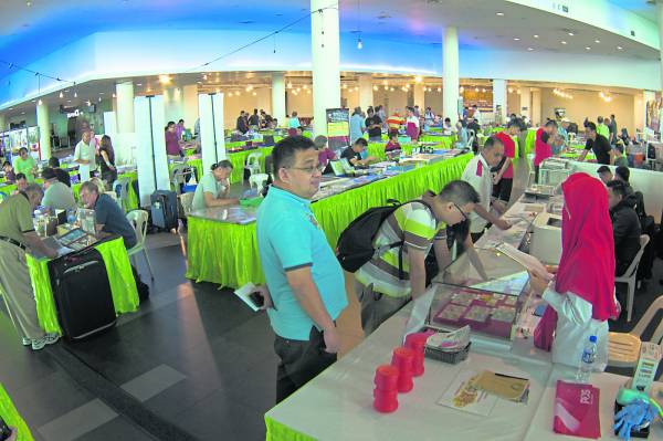 马来西亚古币展览会成为钱币邮票藏家的主要交流平台。