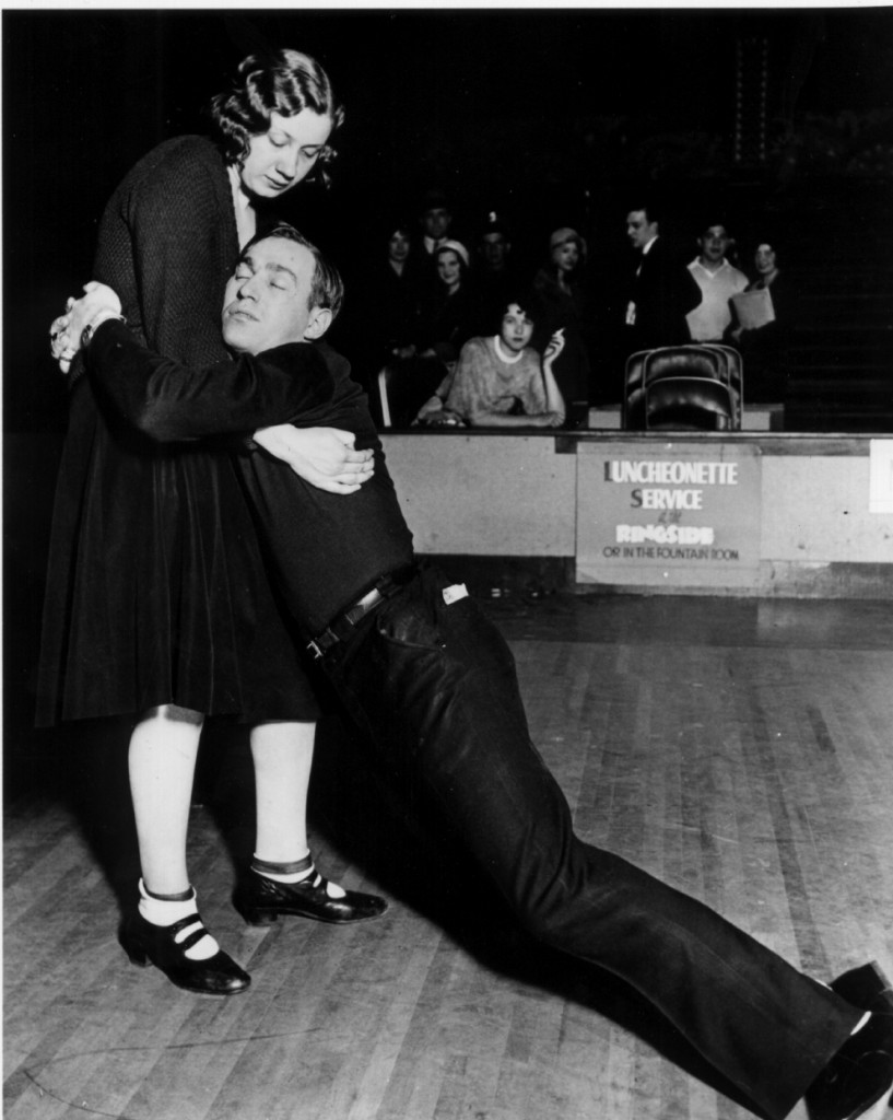 During a marathon contest at Chicago's Merry Garden Ballroom, this couple has danced so hard and so long that the man has fallen asleep, leaving his exhausted partner to support him while she keeps on shuffling. (Newscom TagID: picturehistory014266.jpg) [Photo via Newscom]