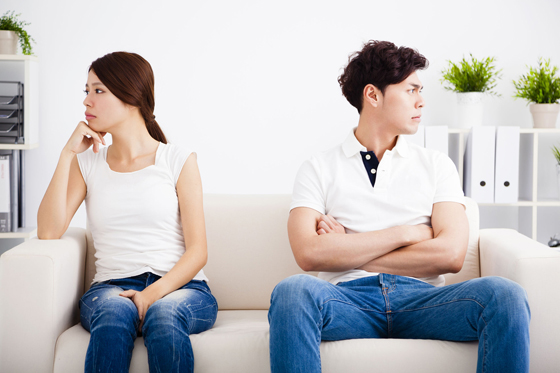 37598803 - young couple stress and  sitting on the sofa