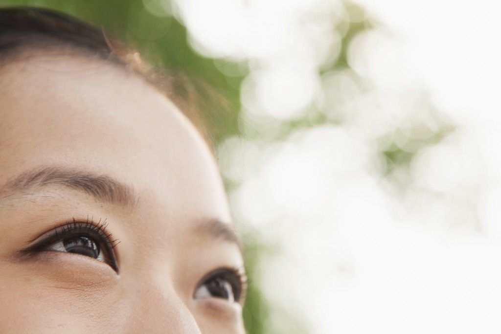 Chinese woman looking up