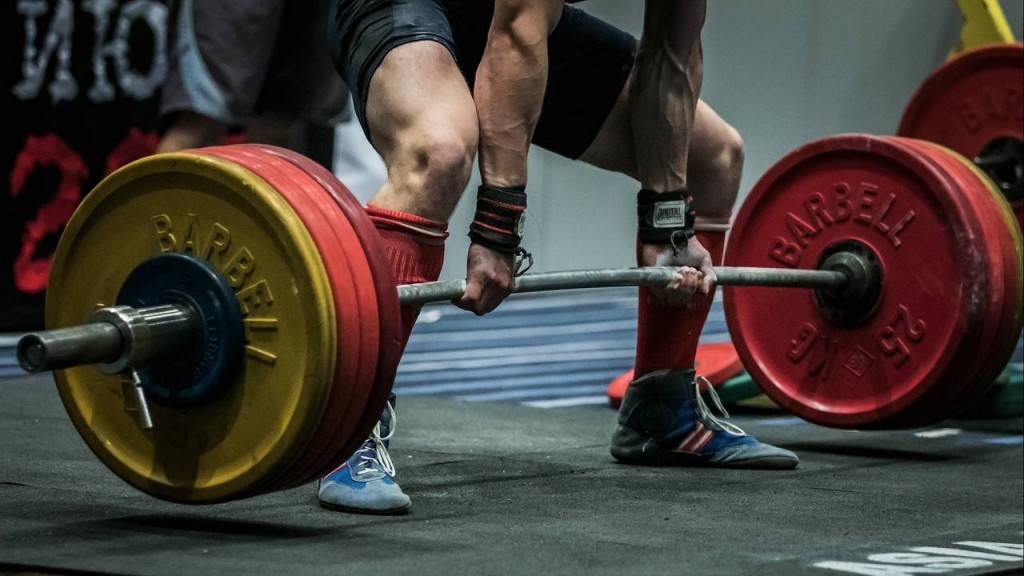 Chelyabinsk, Russia - July 17, 2015: athlete getting ready for a deadlift during National championship powerlifting, bench press and deadlift, Chelyabinsk, Russia - July 17, 2015