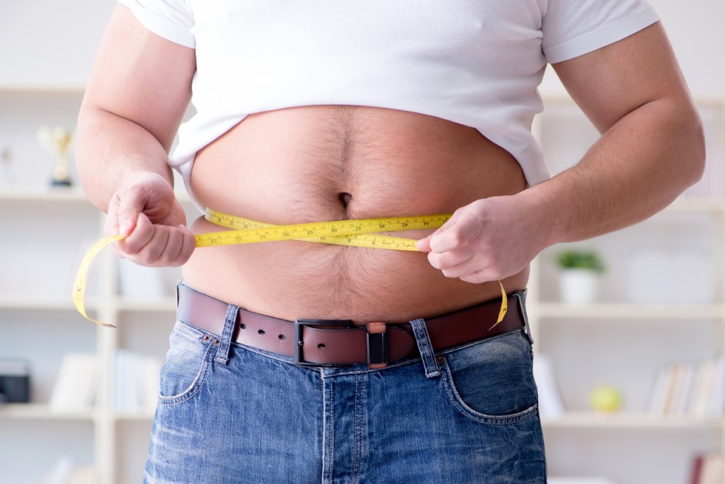 Fat obese man in dieting concept