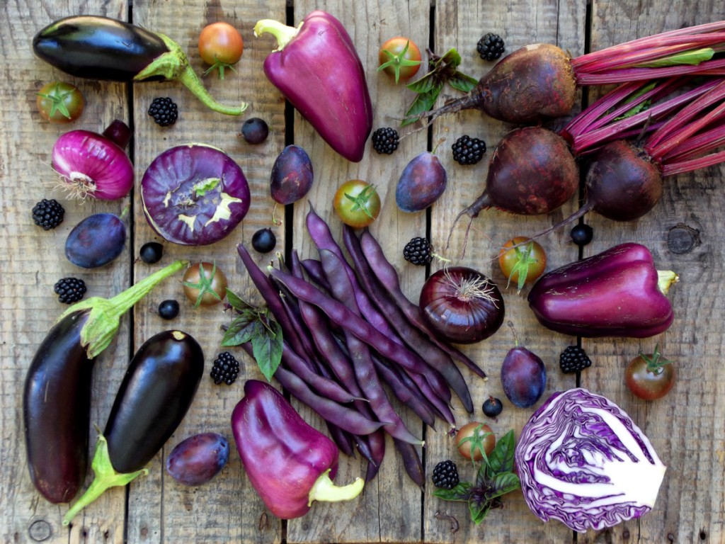Purple,Vegetables,And,Fruits,On,Wooden,Background,-,Eggplant,,Peppers,