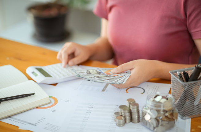 Woman,Hand,Money,And,Giving,Donate,Charity,Raise,Donation,Concept.