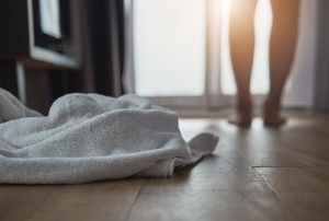 White,Towel,On,The,Floor,In,Bedroom,Interior,,,White